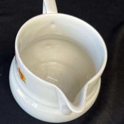 Lot 112 Vintage utilitarian Pitchers