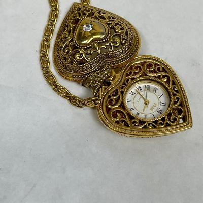 1925 brand Gold tone Necklace with heart pendant concealed clock/watch