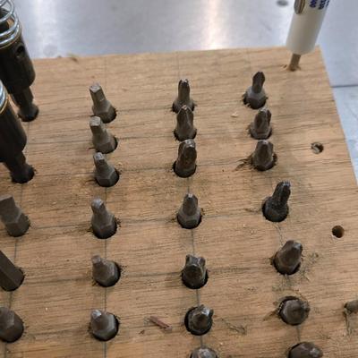 Drill and Router Bits with a Wood Base Organizer