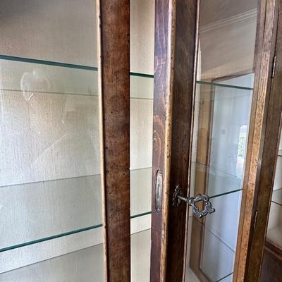 PAIR ARCHED TOP CURIO CABINETS