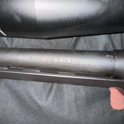 Savage 6.5 × .284 Norma in a MDT Chassis witg Luth AR Buttstock and a Vortex Cantilever Mount with Vortex Ammo