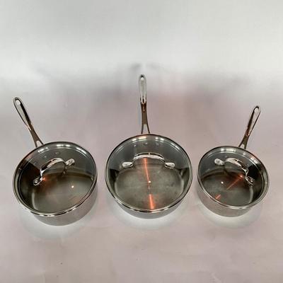 789 Set of 3 Calphalon Stainless Sauce Pots with lids