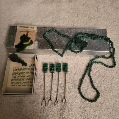 2 JADE PENDANTS AND JADE TONE NECKLACE AND OLIVE PICKS