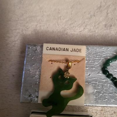 2 JADE PENDANTS AND JADE TONE NECKLACE AND OLIVE PICKS