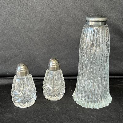 Lot 130 Antique shakers
