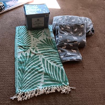 NEW AND USED FLANNEL KING SIZE SHEET SETS AND A THROW BLANKET