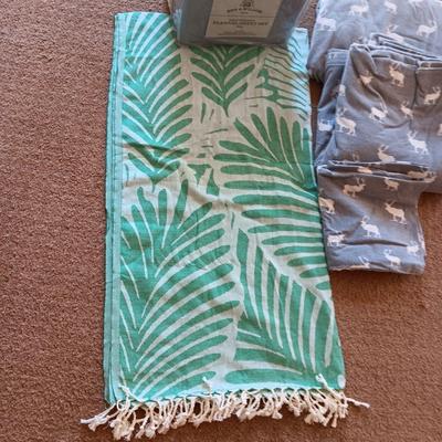 NEW AND USED FLANNEL KING SIZE SHEET SETS AND A THROW BLANKET