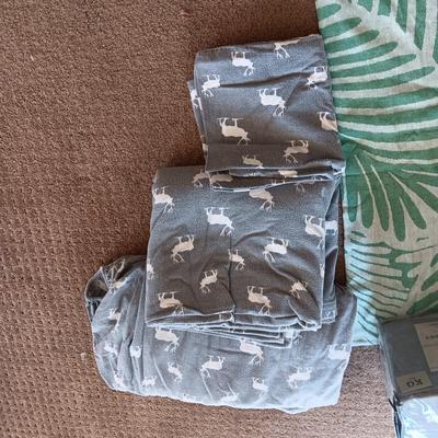 NEW AND USED FLANNEL KING SIZE SHEET SETS AND A THROW BLANKET