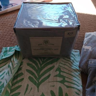 NEW AND USED FLANNEL KING SIZE SHEET SETS AND A THROW BLANKET