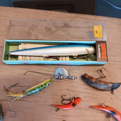 AN ASSORTMENT OF FISHING LURES PLUS MORE