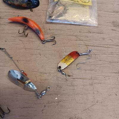 AN ASSORTMENT OF FISHING LURES PLUS MORE