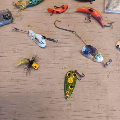 AN ASSORTMENT OF FISHING LURES PLUS MORE