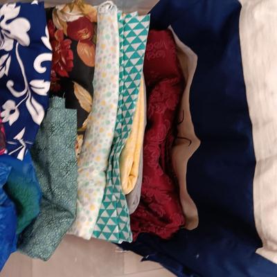 AN ASSORTMENT OF SEWING MATERIAL