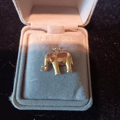 14K ELEPHANT CHARM AND A BRASS ELEPHANT BELT FROM INDIA