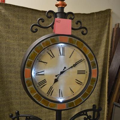 77” Standing 2 Face Clock w/ Plant Hangers &amp; Lighted Face, One LED Out