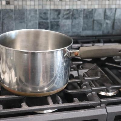 Lot of pots and pans w/ lids
