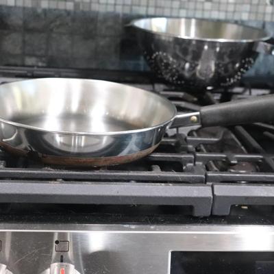 Lot of pots and pans w/ lids