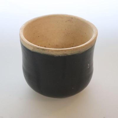 Black and Tan Pottery Bowl