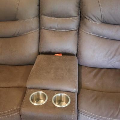 Sectional 3 piece with 6 seater reclining couch. Brown in color.