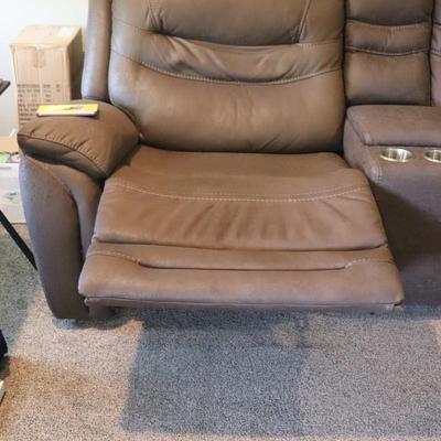 Sectional 3 piece with 6 seater reclining couch. Brown in color.