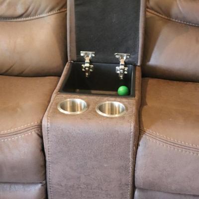 Sectional 3 piece with 6 seater reclining couch. Brown in color.