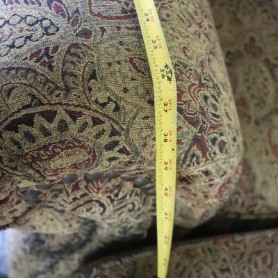 Overstuffed chair and ottoman