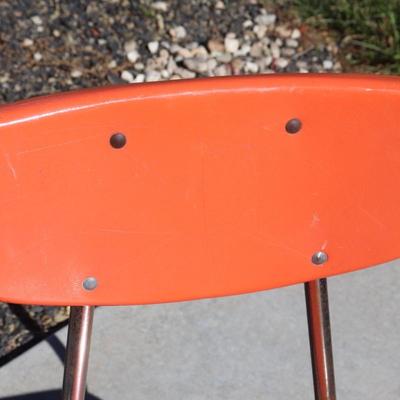 2 orange school-aged chairs