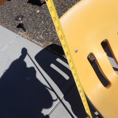 2 yellow school-aged chairs