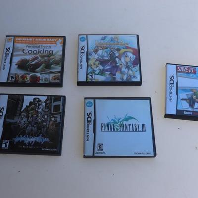 Pink Nintendo DS with games