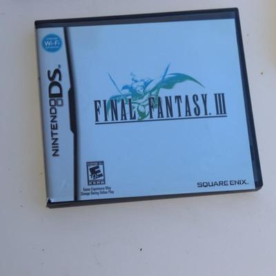 Pink Nintendo DS with games