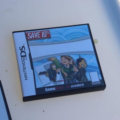 Pink Nintendo DS with games