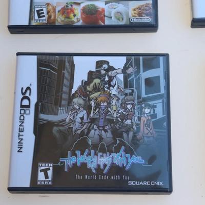 Pink Nintendo DS with games