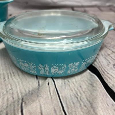 Sale Photo Thumbnail #60: These are beautiful Amish print blue Pyrex dishes. The numbers are on the pictures. There are no cracks breaks worships. They’re in very good condition.. numbered. 471,473, 2x410