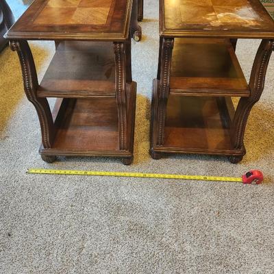 Brown furniture coffee table and two end tables.