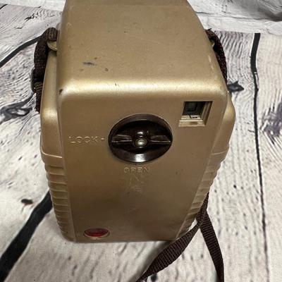 Sale Photo Thumbnail #195: Brownie Bullseye Camera
This would make a great camera to sit on your bookshelf for decor. I don’t know anything about cameras however I did wind it and then push down the button and it does click. Does that mean it works? I don’t know? So the lever w