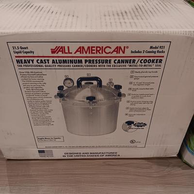 ALL AMERICAN CAST ALUMINUM PRESSIRE CANNER AND PINT JARS