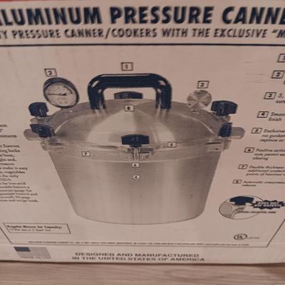 ALL AMERICAN CAST ALUMINUM PRESSIRE CANNER AND PINT JARS