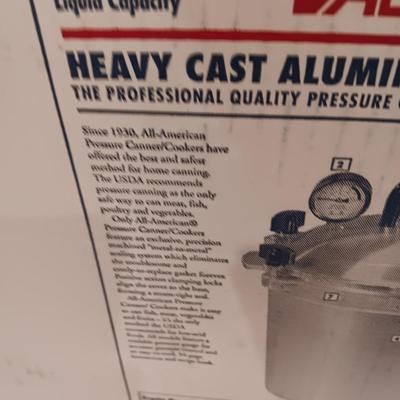 ALL AMERICAN CAST ALUMINUM PRESSIRE CANNER AND PINT JARS