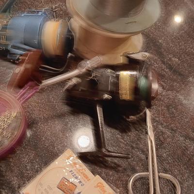 FISHING REELS AND LINE