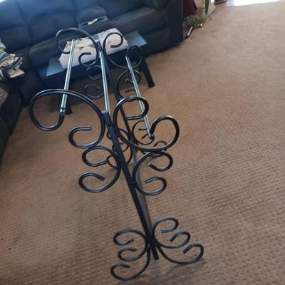 HANDMADE AFGHAN AND A METAL AFGHAN HOLDER