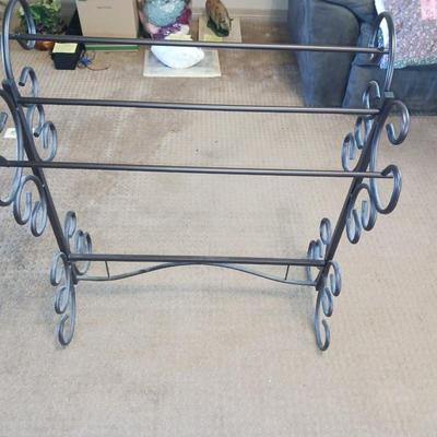 HANDMADE AFGHAN AND A METAL AFGHAN HOLDER