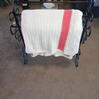 HANDMADE AFGHAN AND A METAL AFGHAN HOLDER