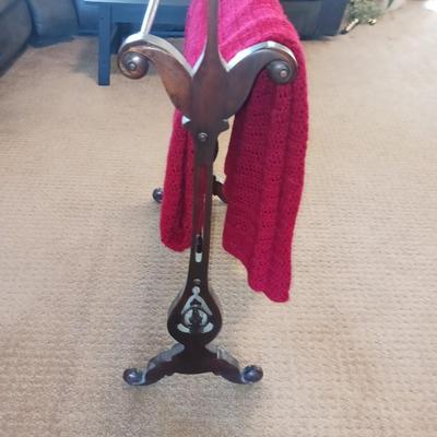HANDMADE AFGHAN AND A WOODEN AFGHAN HOLDER