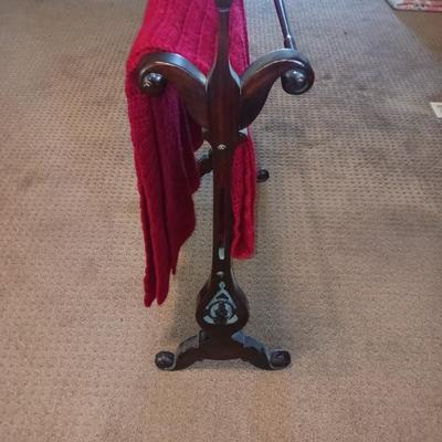 HANDMADE AFGHAN AND A WOODEN AFGHAN HOLDER