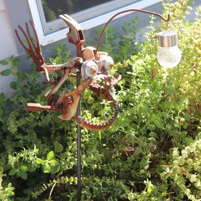 angler fish yard artwork