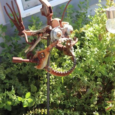 angler fish yard artwork