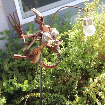 angler fish yard artwork