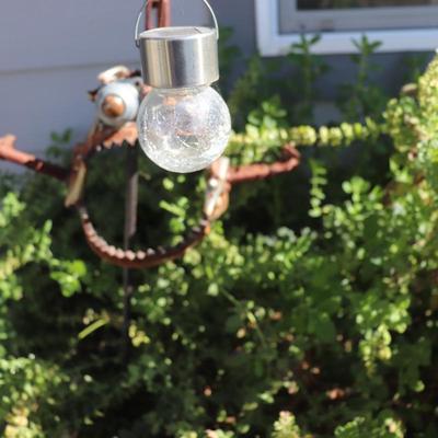 angler fish yard artwork