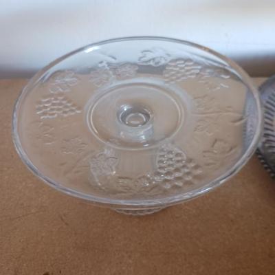 SILVER PLATED SERVING PIECES AND A GLASS CAKE PLATE