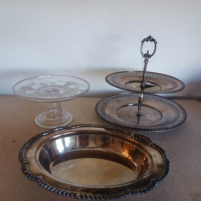 SILVER PLATED SERVING PIECES AND A GLASS CAKE PLATE